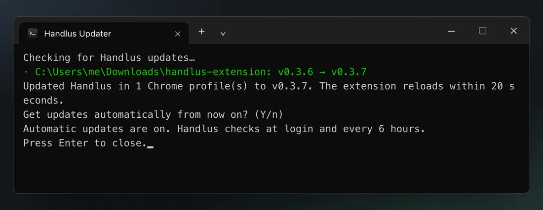 Handlus Updater window on Windows with the updated folder, the automatic update question and Press Enter to close